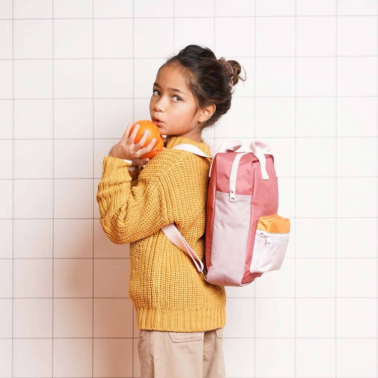 girl with rucksack on white background. engel recycled backpack