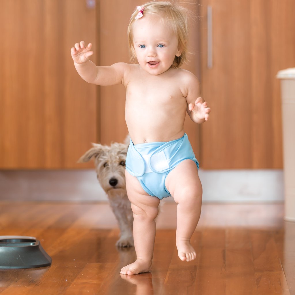 littlelamb baby wearing reusable nappy with wrap